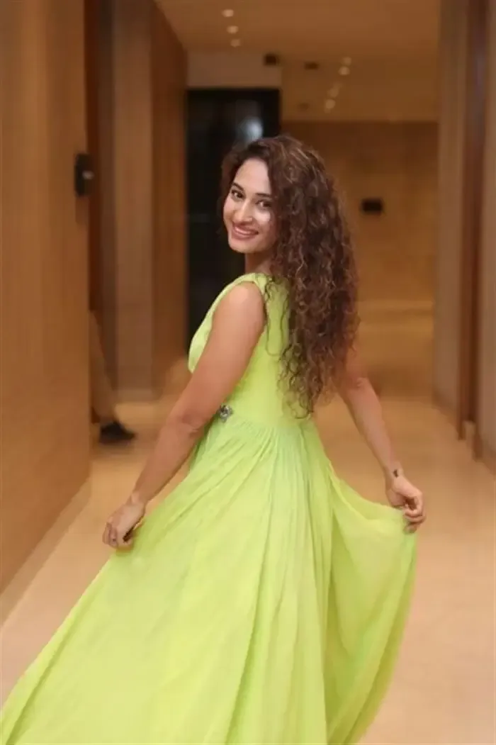 Indian Actress Pooja Ramachandran Images in Long Green Gown